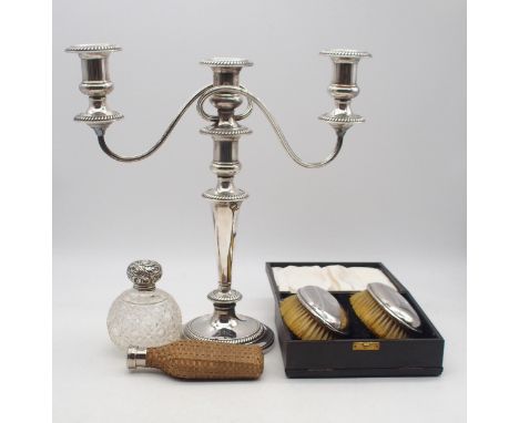 A collection of silver and EPNS including a cased pair of brushes, by Joseph Gloster Ltd, Birmingham 1924, a silver topped cu