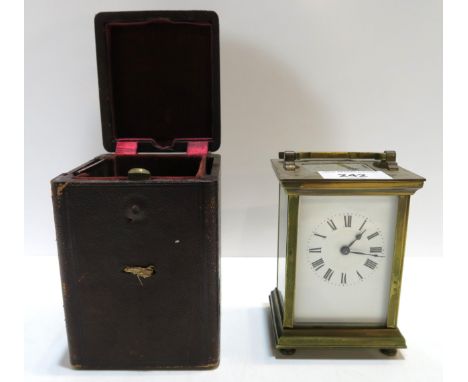 A French brass and glass carriage clock with travelling case Condition Report:Available upon request