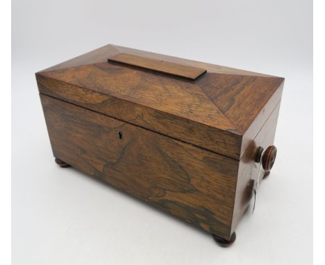 A 19th century rosewood rectangular-form tea caddy, measuring approx. 32cm wide x 19cm high x 18cm deep Condition Report:Avai