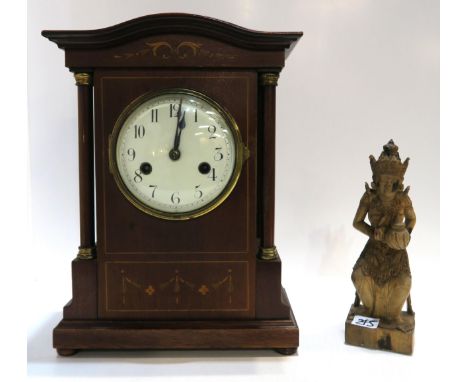 A wooden Balinese figure of a dancer and a inlaid mantle clock Condition Report:Available upon request