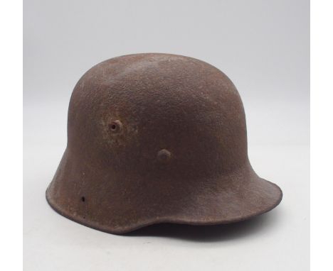 A WW1 German M-16 steel helmet, or Stahlhelm, lacking liner Condition Report:Available upon request