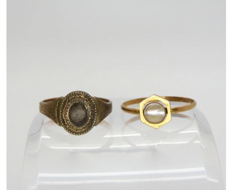 A 9ct gold mourning ring with plaited hair under glazed panel, finger size R, Chester hallmarks for 1897, together with a 9ct