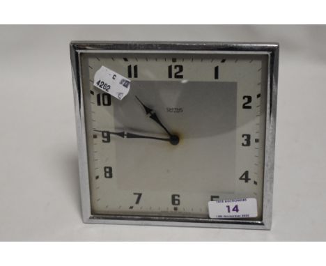 An Art Deco Smiths mantel clock with chrome frame