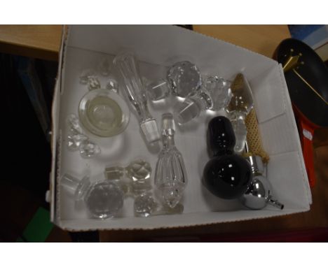 A selection of cut and blown glass decanter stoppers