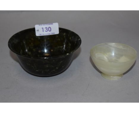 A 20th century spinach jade Chinese bowl having good colour with a similar white Jade bowl
