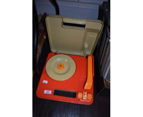 A mid century Fisher Price vinyl record player