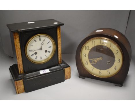 A late Victorian mantel clock of slate and marble with enamel dial, and a later oak Art Deco clock