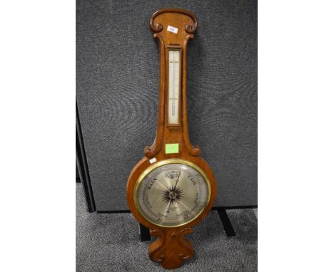 An early 20th century L Gasartelli large sized aneroid banjo form barometer with oak casing and mercury mechanism