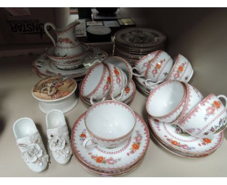 A Davenport style tea service having floral decoration a Prattware lidded pot, The Wolf and the Lamb and a pair of Victorian 