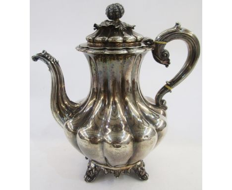 William IV silver coffee pot, baluster shape and panelled with melon and foliate finial, scroll handle on shell and scroll su