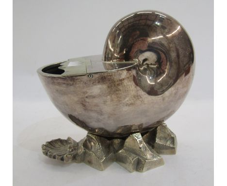 Late 19th / Early 20th century silver plated spoon warmer in the form of a conch shell,  by William Hutton & Sons, on rocky b