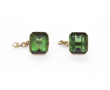 Pair of emerald-cut green tourmaline cufflinks&nbsp;in gold-coloured mounts with chain link (missing back plate), unmarked, a