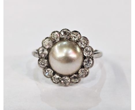 Platinum, pearl and diamond ring, the central pearl surrounded by diamonds, finger size M1/2&nbsp;