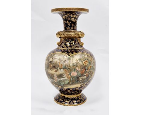 Japanese Late Meiji period (1868-1912) blue-ground globular Satsuma vase, finely painted and gilt with two lobed cartouches, 