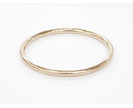 9ct gold hollow bangle of plain circular form, approx. 12g&nbsp;