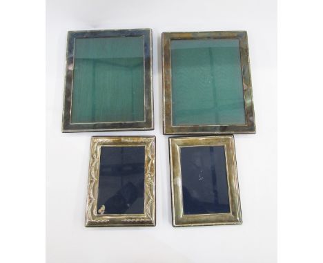 Silver photograph frame by Carr's of Sheffield, 1994 of rectangular form with bow, swag and harebell decoration, 17cm x 22cm,