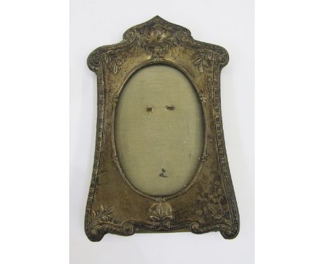 Edwardian silver photograph frame by Boots Pure Drug Company, Sheffield 1908, of shaped design with floral and scrolling deco