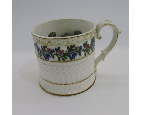 Pearlware 'Winchester Measure' frog mug, circa 1820, applied to the interior with two brown frogs, floral and basket weave mo