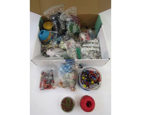 A large quantity of beads, part necklaces and jewellery making equipment (1 box)