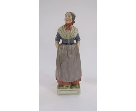 20th century Royal Copenhagen porcelain figure designed by Carl Martin-Hansen (circa 1906-1925), 'Faero', a bonneted country 