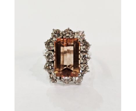 18ct gold dress ring set central peach topaz rectangular stone surrounded by diamonds, weight 7gms approx, topaz 1.4cm long x