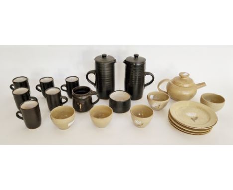 Studio pottery coffee set by Dennis Lacey for Fownhope Pottery, with black glaze, consisting of two coffee pots, six coffee c