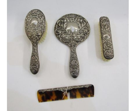 Silver backed four piece dressing set, Birmingham 1962 &amp; 1963, W I Broadway &amp; Co, in the Victorian style comprising h