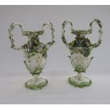 Pair of English porcelain Coalbrookdale two-handled rocaille flower-encrusted vases, circa 1835,