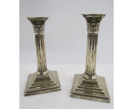 Pair of Victorian / Edward VII silver candlesticks, Sheffield 1901, Henry Hobson &amp; Sons, of Corinthian column form on ste