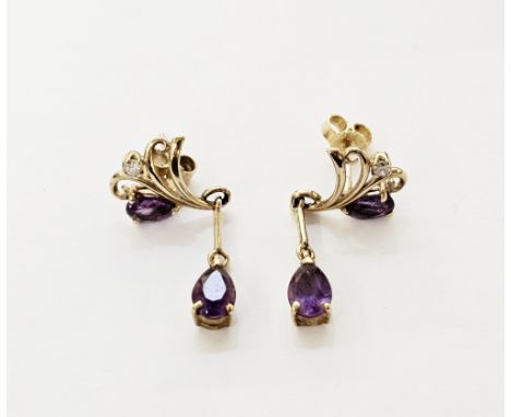 Pair of 9ct gold stud earrings, each set with a teardrop amethyst and diamond within the scrolling setting and with amethyst 