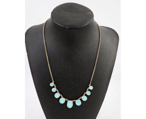9ct gold and opal necklace set nine graduated oval opals on integral circular link chain, weight approx 13gms.Condition Repor