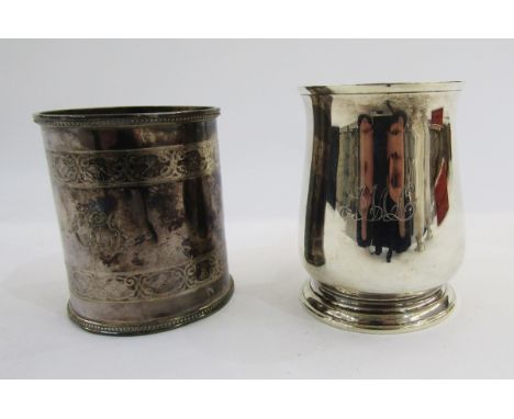 A silver mug by Edward Barnard &amp; Sons Ltd London 1928, of plain baluster form with scroll handle on circular foot, 9cm hi