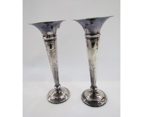 Pair George V silver trumpet vases, each partly hammered, Sheffield 1928, makers Walker &amp; Hall, on circular foot, 27cm hi