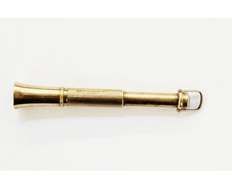 9ct gold retractable cigar piercer of trumpet design with engine turned decoration, approx 11g, approx 7.5cm long