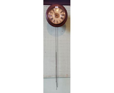 A late 19th century wooden framed postman's alarm wall clock.