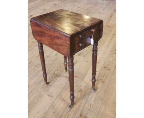 A William IV mahogany worktable with drop leaf top, over two drawers on turned castor legs. Condition Report: Top bare and po
