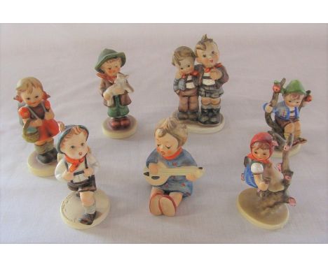 7 Goebel hummel figures of children (1 with chip to hair)