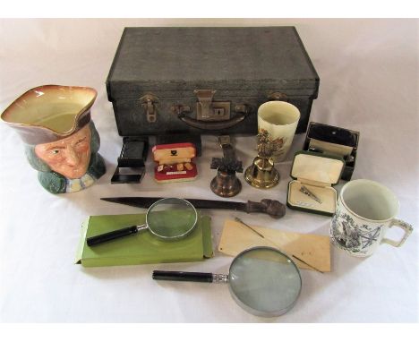 Small vintage suitcase containing large Royal Doulton Vicar of Bray character jug, Zippo lighter, magnifying glasses, costume