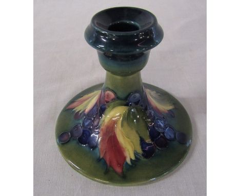 Moorcroft leaf and berries design candlestick H 11 cm initialled WM to underside
