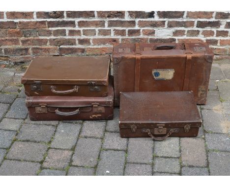 4 vintage suitcases