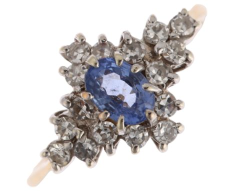 A modern 9ct gold sapphire and diamond lozenge cluster ring, claw set with 0.6ct oval mixed-cut sapphire and single-cut diamo