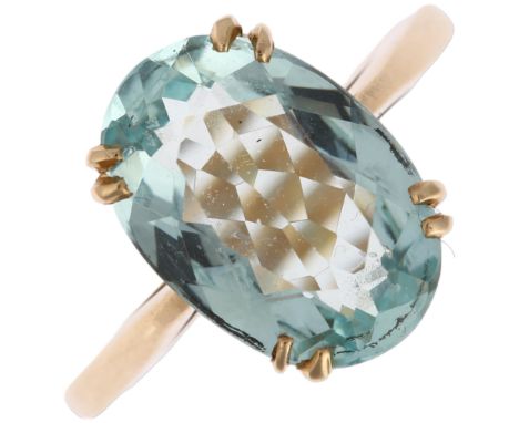 A modern 9ct gold aquamarine dress ring, set with 3.8ct oval mixed-cut aquamarine, weight calculated from dimensions: 3.72 x 