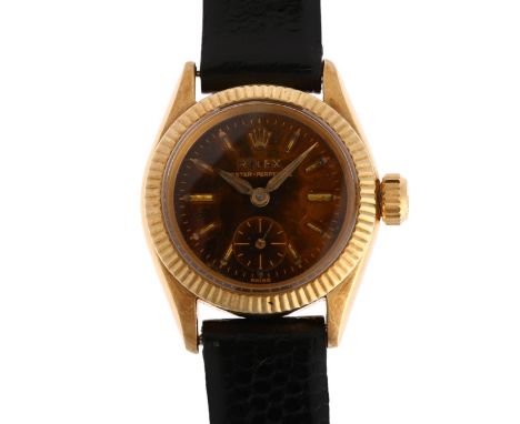 ROLEX - a lady's 18ct gold Oyster Perpetual automatic wristwatch, ref. 6509, tropical dial with applied gilt baton hour marke