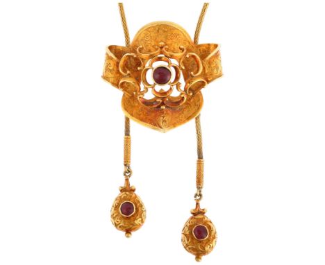 A Victorian garnet tassel pendant necklace, circa 1890, each pendant rub-over set with round cabochon foil-back garnets withi