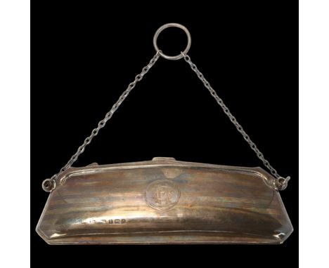 An Art Deco George VI silver lady's purse, S Blanckensee & Son Ltd, Birmingham 1938, compact elongated form with engine turne