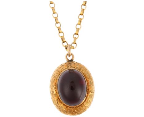 A Victorian 15ct gold garnet memorial locket pendant necklace, the central foil-back oval cabochon garnet within floral engra