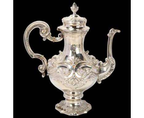 A Portuguese 833 standard silver coffee pot, pedestal baluster form, with high relief embossed and chased foliate decoration,