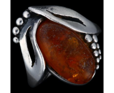 NIELS ERIK FROM - an Art Nouveau Danish sterling silver and amber floral ring, setting height 21.9mm, size O, 6.7gNo damage o