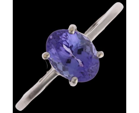 A modern 14ct white gold solitaire tanzanite ring, claw set with 1.5ct oval mixed-cut tanzanite, size L, 2.2gNo damage or rep