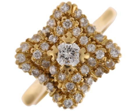 A late 20th century 18ct gold diamond cluster ring, import London 1980, square stepped wavy form, pave set with modern round 